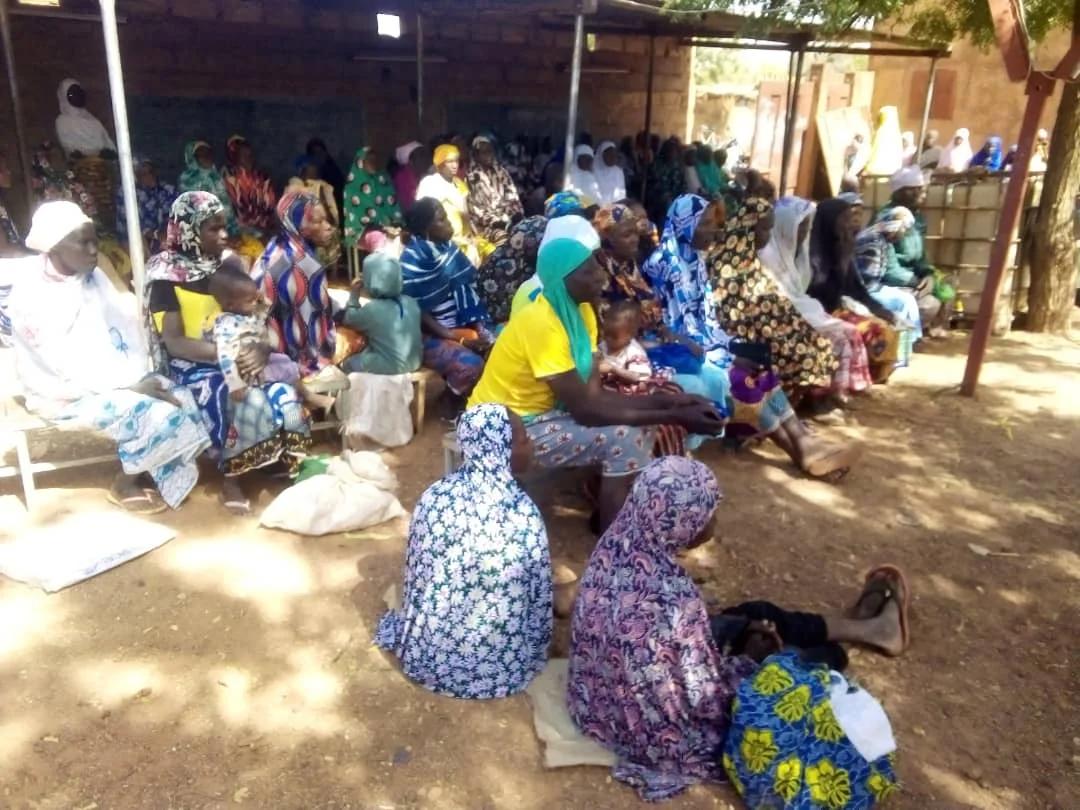 Poor village with women and children in Burkina Faso